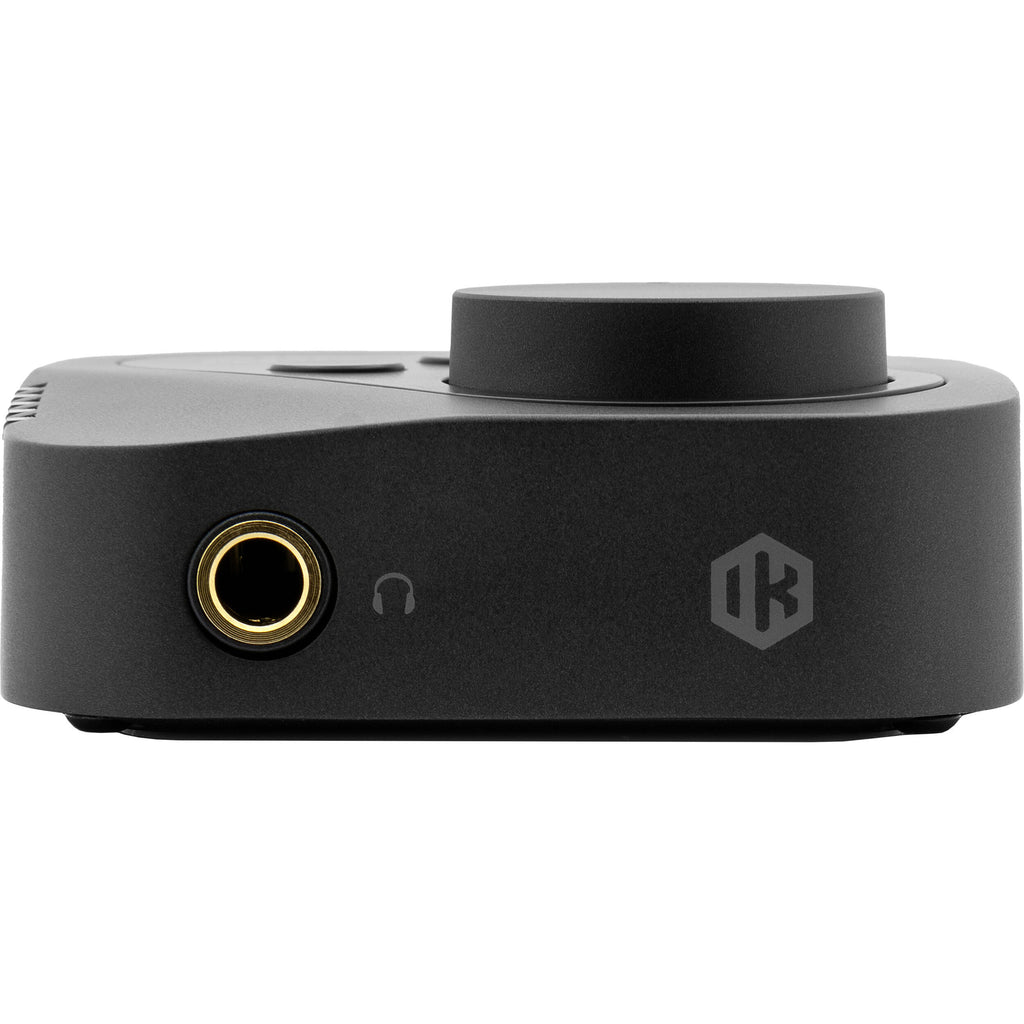 IK Multimedia ARC ON EAR headphone amplifier and DAC with sleek black design and control buttons on the front panel.