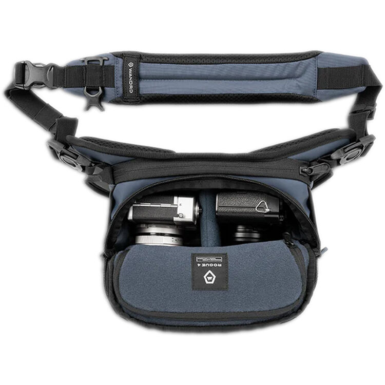 Wandrd Rogue Sling video equipment bag with adjustable strap and multiple compartments for cameras and accessories.