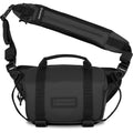 Wandrd Rogue Sling video equipment bag with adjustable strap and multiple compartments for camera gear and accessories.