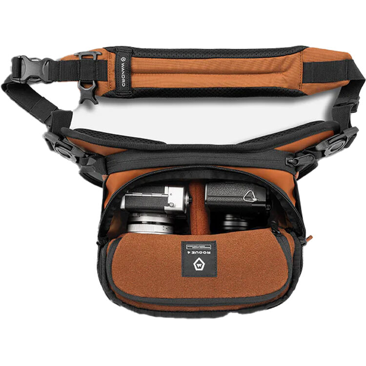 Wandrd Rogue Sling video equipment bag with adjustable strap and multiple compartments for camera gear storage.