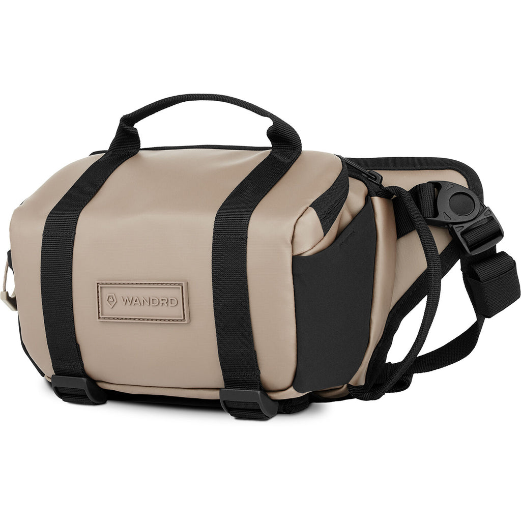 Wandrd Rogue Sling video equipment bag with adjustable strap and multiple compartments for camera gear and accessories.