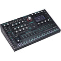ASM Leviasynth desktop synthesizer with knobs and controls, compact electronic music instrument for studio or performance use.