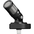 Shure MV88 iOS and Android microphone connected to a smartphone, showcasing portable audio recording capabilities.