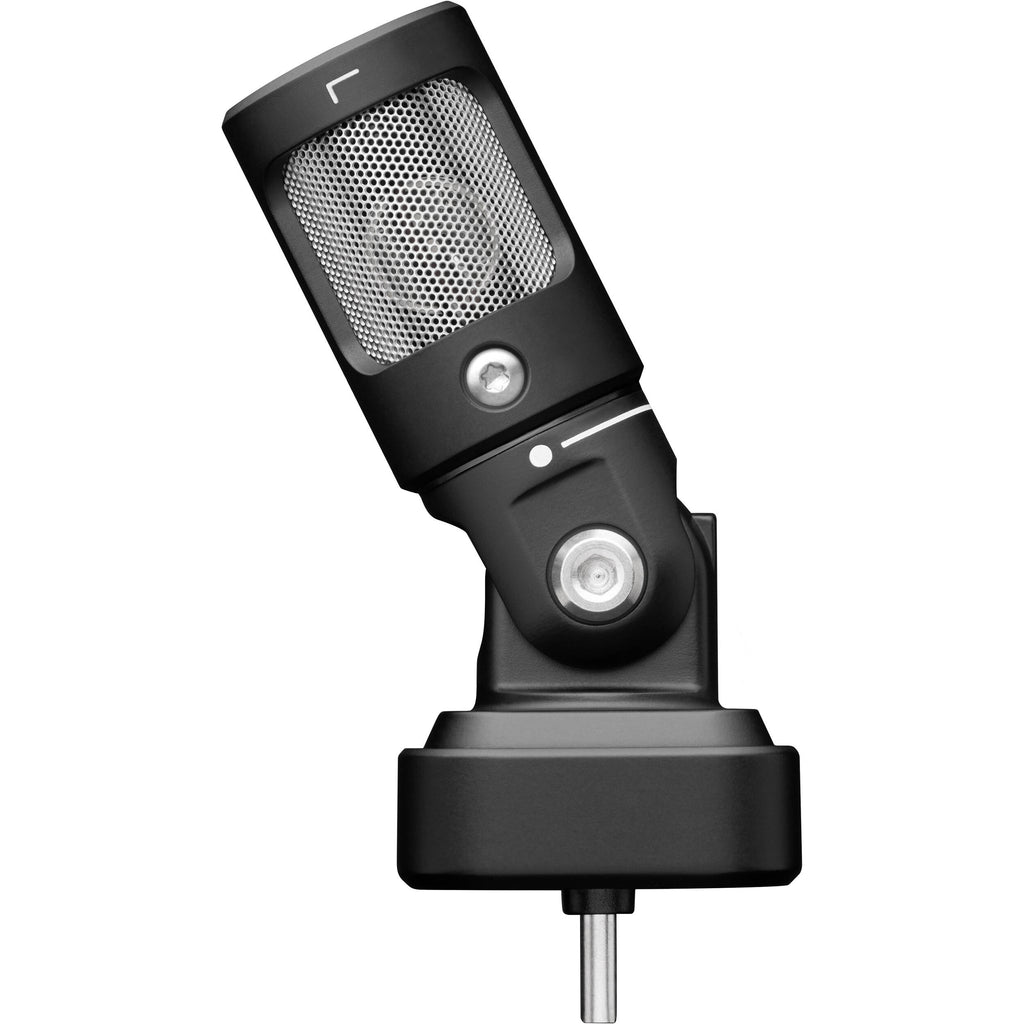 Shure MV88 iOS and Android microphone connected to a smartphone, compact and portable audio recording device.