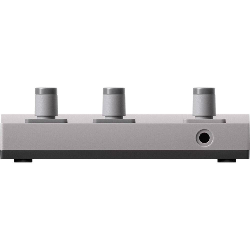 Teenage Engineering EP-136 K.O. Sidekick DJ mixer with colorful knobs and compact design, perfect for portable DJ setups.
