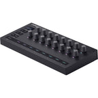 Novation Launch Control 3 MIDI controller with knobs and buttons for music production, shown on a desk setup.