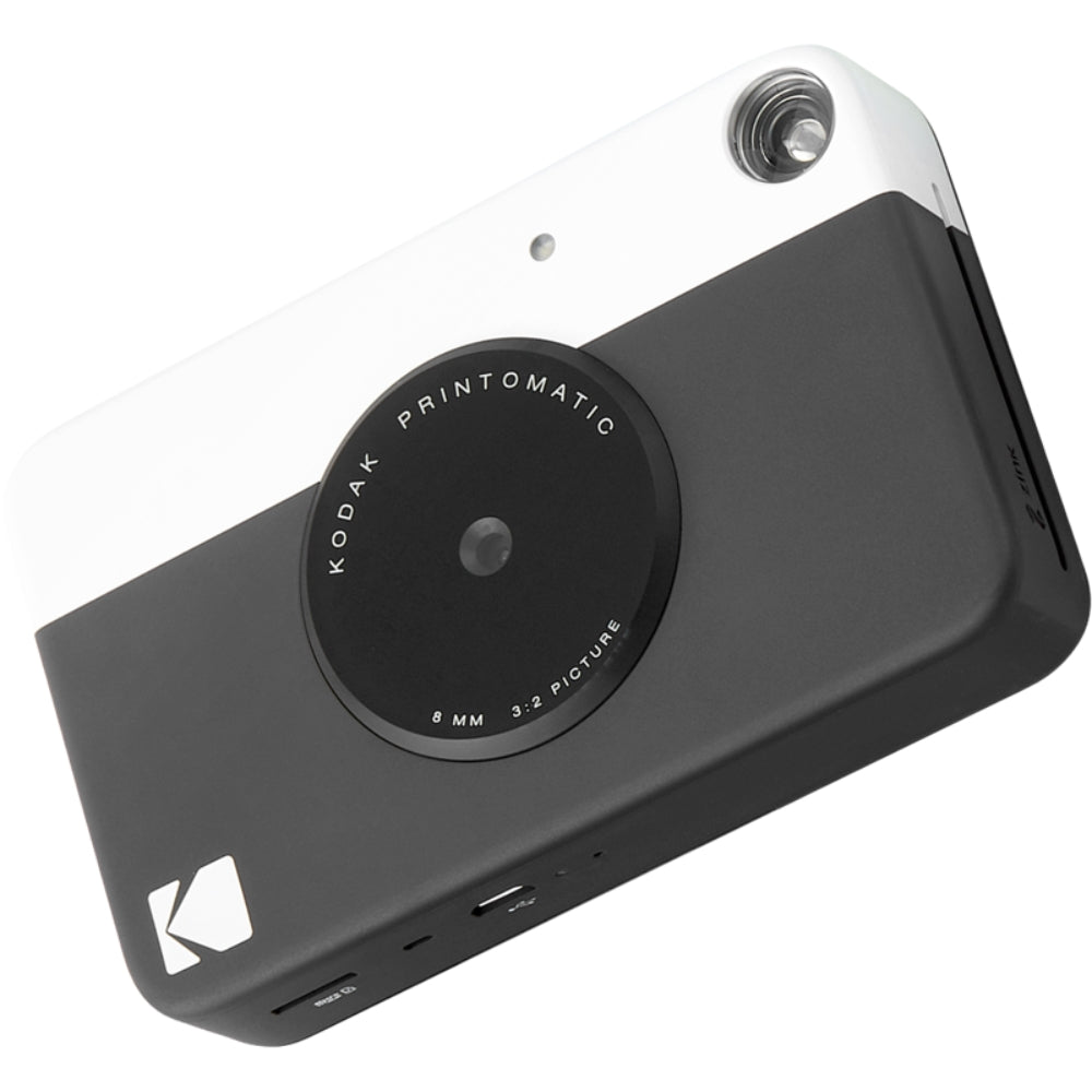 Kodak Printomatic instant compact camera with black body and lens, ready for quick photo prints.
