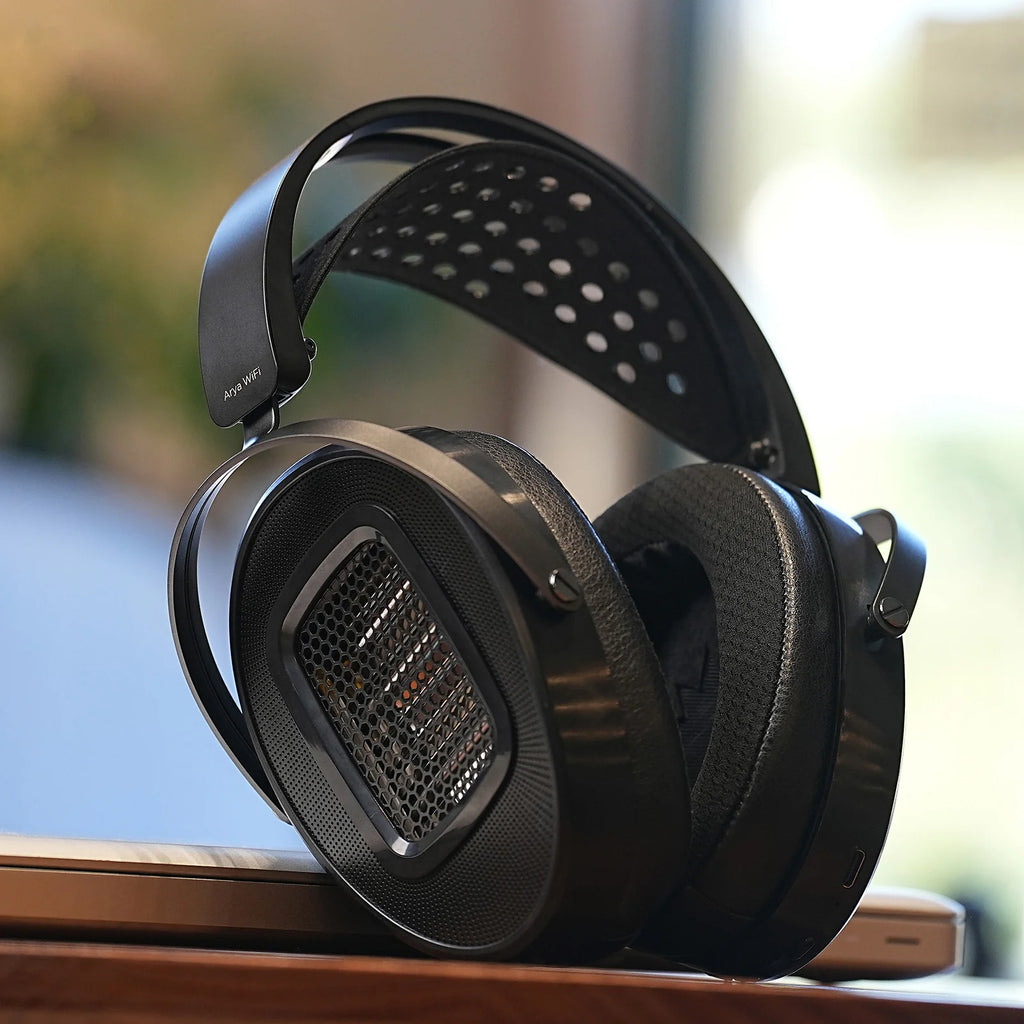 HiFiMAN Arya WiFi wireless headphones with open-back design and over-ear cups, featuring sleek black finish and plush ear cushions.