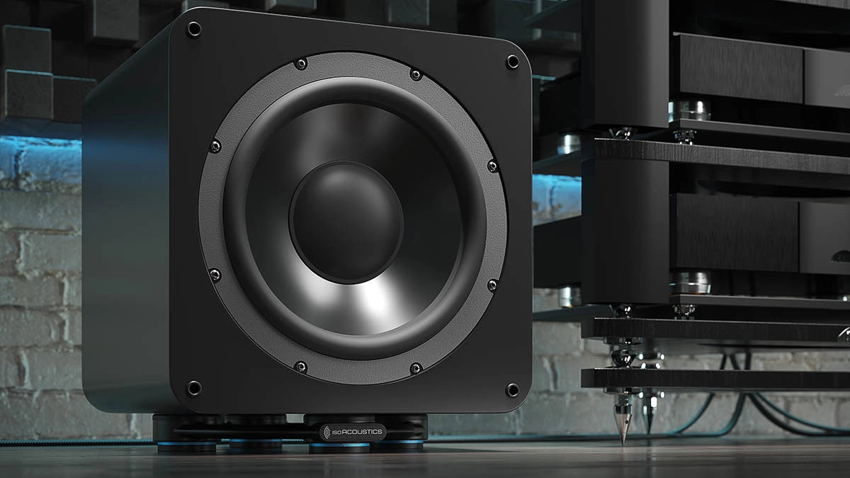 IsoAcoustics Aperta SUB XL speaker stands supporting a subwoofer, featuring sleek design and sturdy construction for optimal audio support.