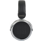 HiFiMAN HE400se wired headphones with open-back design and plush ear cushions, displayed on a neutral background.