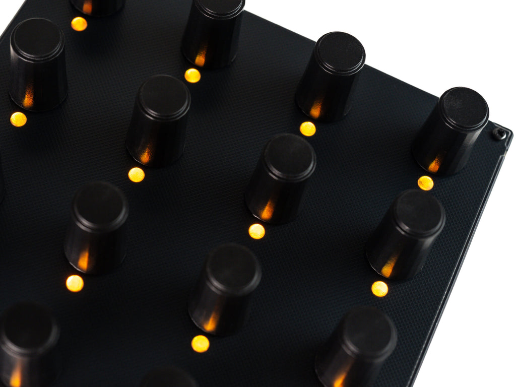 Close-up of Intech Studio EN16 Detent Series 3 MIDI Controller with detailed knob and button layout.