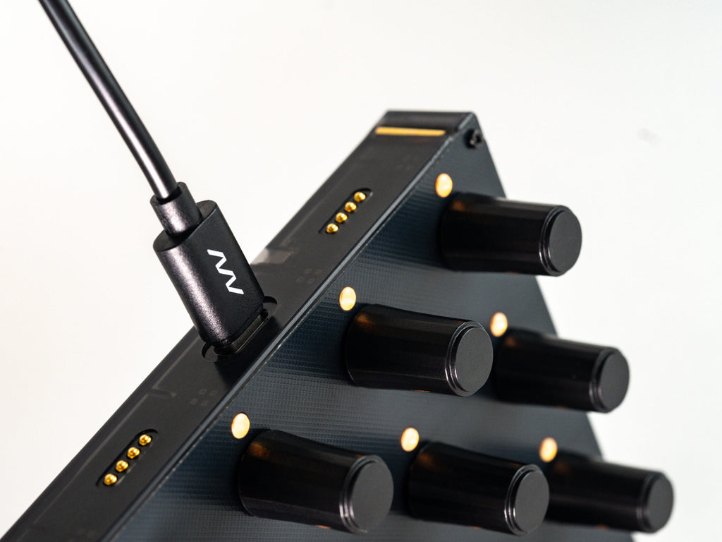 Close-up of the Intech Studio EN16 Detent MIDI controller from Series 3, showing detailed control knobs and interface features.