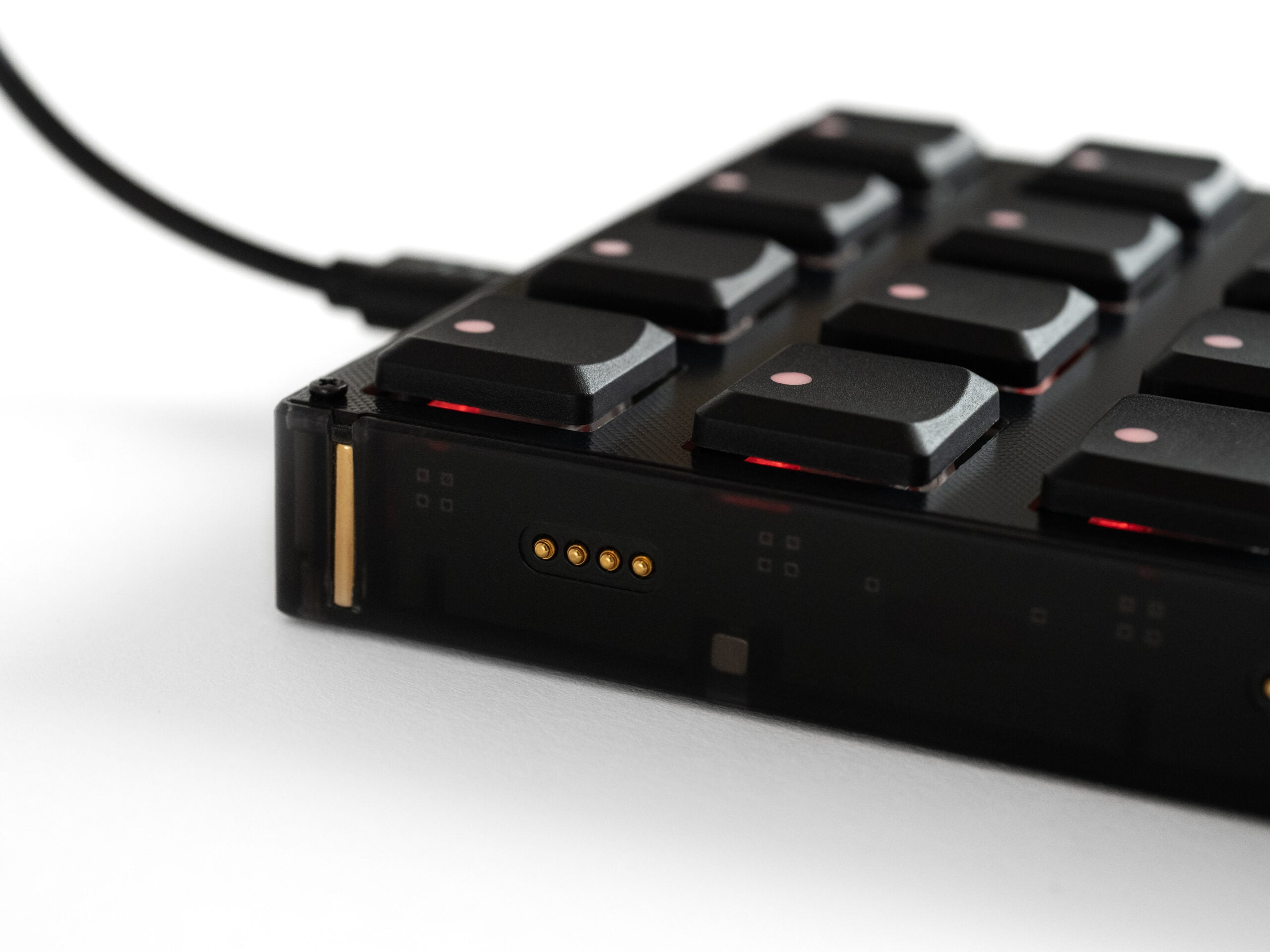 Close-up of Intech Studio BU16 Series 3 MIDI controller with knobs and buttons for music production.