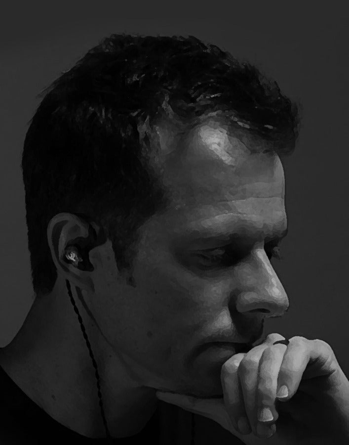 Astell&Kern XIO wired in-ear headphones with black earbuds and inline remote on a white background.