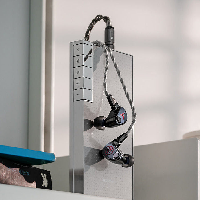 Astell&Kern XIO wired in-ear headphones with sleek black design and in-line remote for portable high-quality audio.