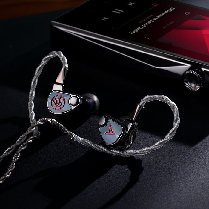 Astell&Kern XIO wired in-ear headphones with sleek black design and ear tips, positioned on a plain background.