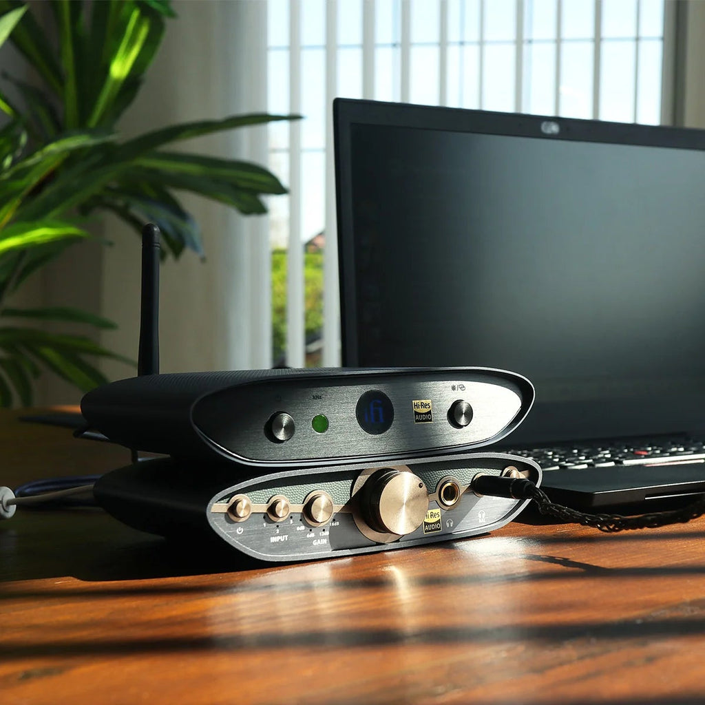 iFi Audio ZEN Air Blue 2 Bluetooth and Wi-Fi audio receiver connected to a home audio system, showcasing compact design and controls
