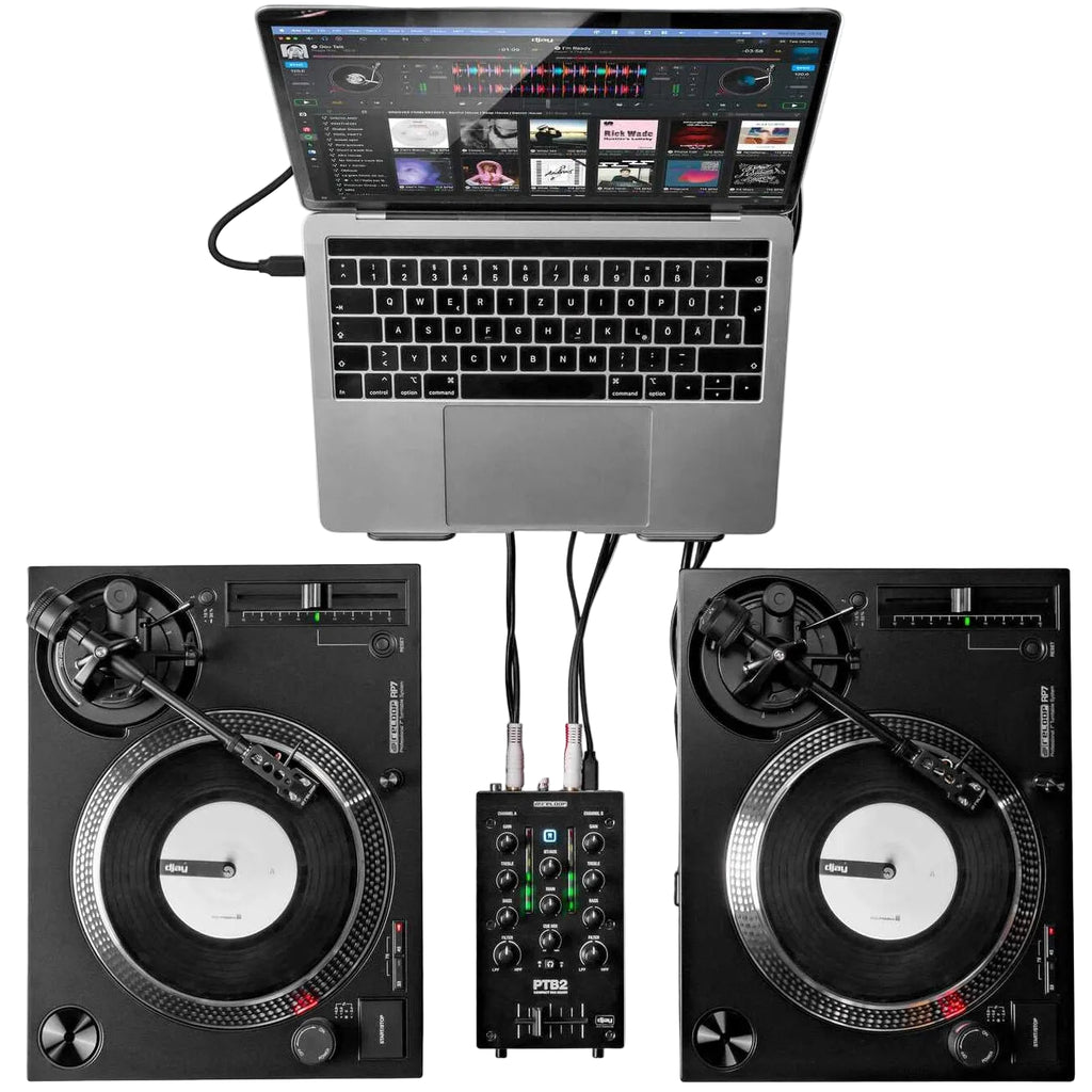 Reloop PTB-2 DJ mixer with multiple knobs, faders, and input ports, designed for professional DJ mixing and audio control.