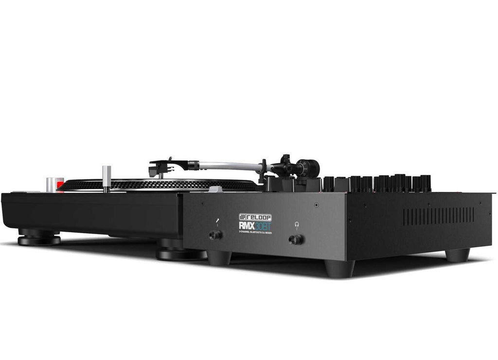 Reloop RMX-30 BT DJ mixer with dual channels, knobs, and Bluetooth connectivity, shown in a professional DJ setup.