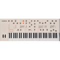 Frap Tools Magnolia keyboard synthesizer with sleek black design and multiple control knobs on a tabletop.