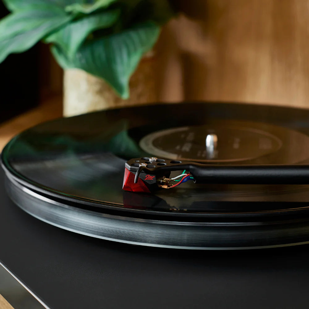 Ortofon 2MR Red turntable cartridge with stylus installed, designed for high-quality vinyl playback.