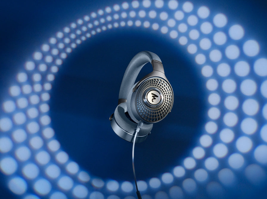 Focal Azurys wired headphones in blue with over-ear design and plush ear cushions for immersive listening.