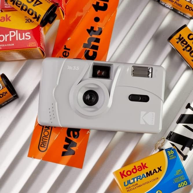 Kodak M35 reusable compact camera with manual controls and vibrant blue body, ideal for instant photography.