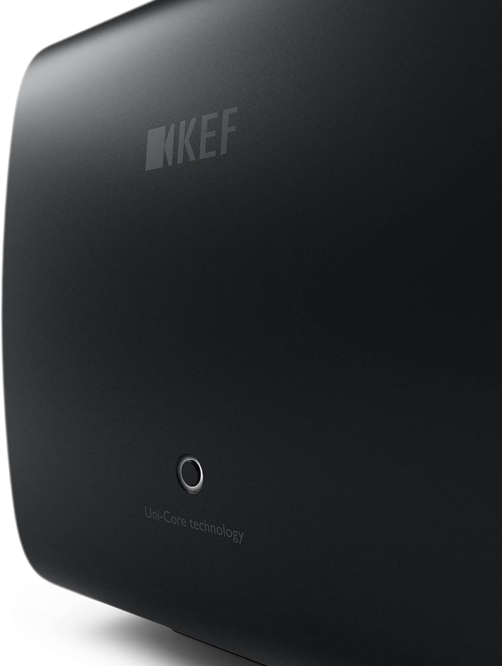 KEF KC62 subwoofer with sleek black enclosure and compact design, ideal for enhanced bass in home audio systems.