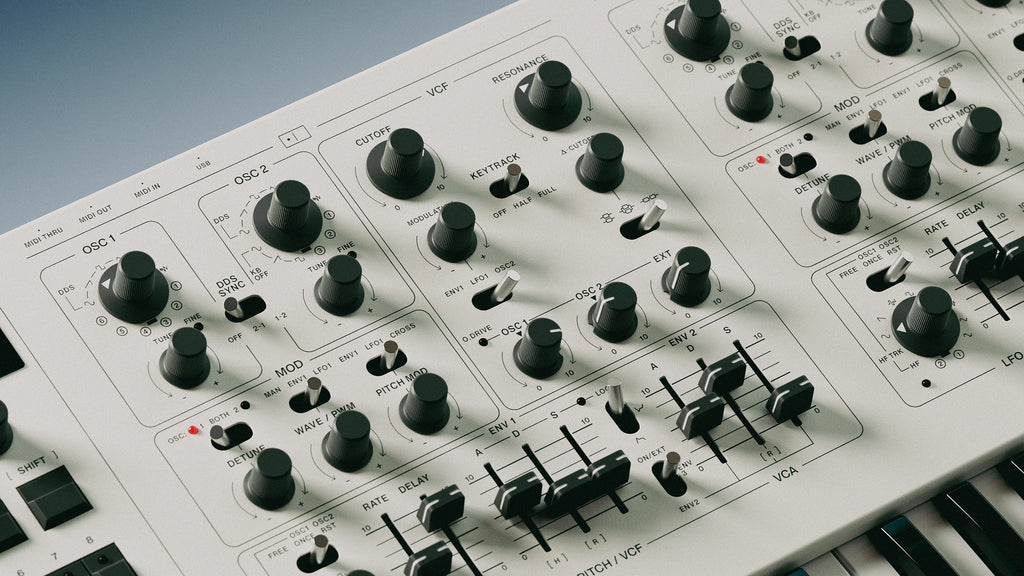 UDO Audio DMNO keyboard synthesizer with multiple control knobs and keys, showcasing its modern design and compact layout.