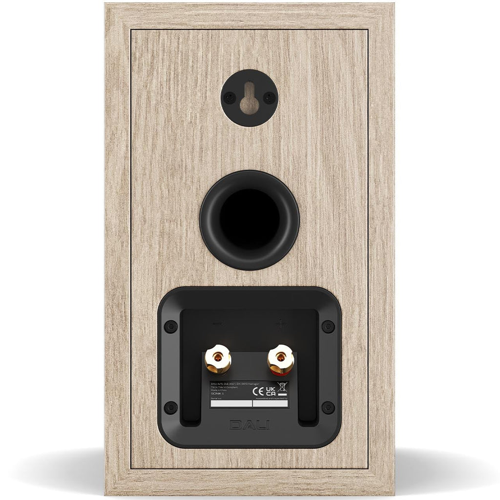 DALI Sonik 1 passive bookshelf speakers with black cabinets and front grille, designed for high-quality home audio listening.