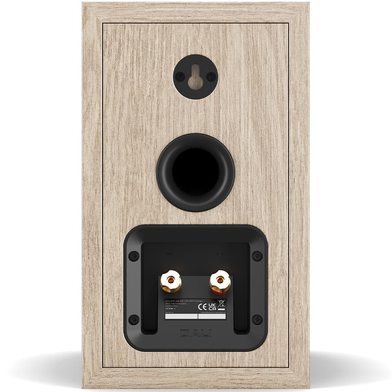 DALI Sonik 1 passive bookshelf speakers with black cabinets and front grille, designed for high-quality home audio listening.