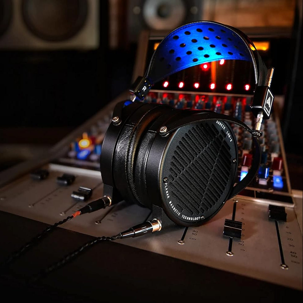 Audeze LCD-X Creator Package studio headphones with leather-free ear cushions, black and silver design for professional audio production.