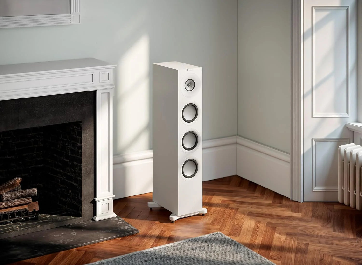 KEF Q11 Meta passive floorstanding speaker with sleek black finish and modern design, showcasing multiple speaker drivers and grille.