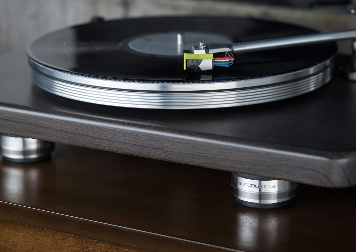 IsoAcoustics Orea Bronze speaker stands with sleek design and adjustable height for optimal audio performance.