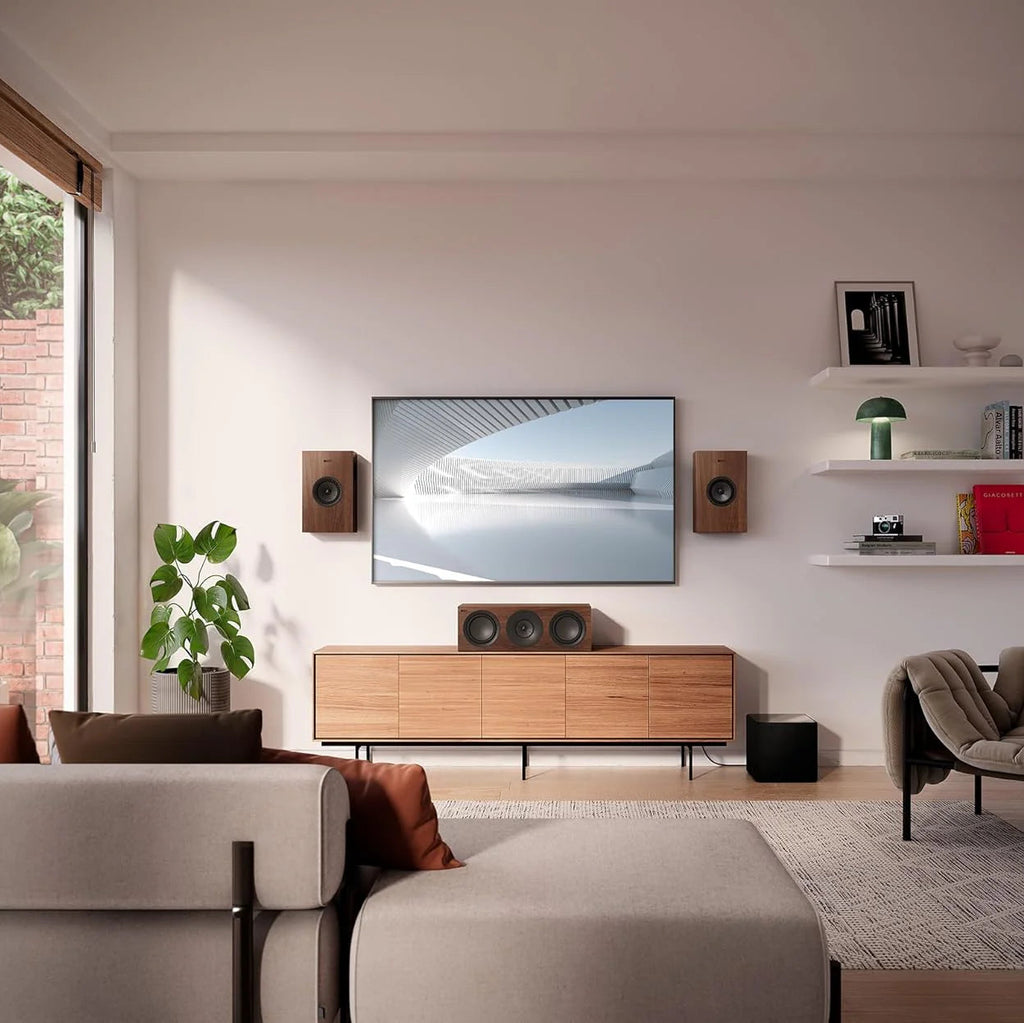 KEF Q4 Meta in-wall and outdoor speakers with sleek design and black finish, showcasing high-quality audio performance.