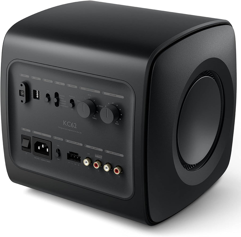 KEF KC62 compact subwoofer with sleek black enclosure and control panel, designed for high-quality bass in home audio systems.