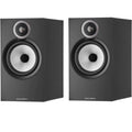 Bowers & Wilkins 606 S3 passive bookshelf speakers with black speaker grilles and wood finish, ideal for home audio systems.