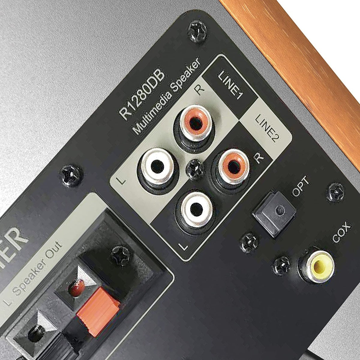 Edifier R1280DBS desktop speakers with wood finish and control knobs on the front, designed for high-quality audio.