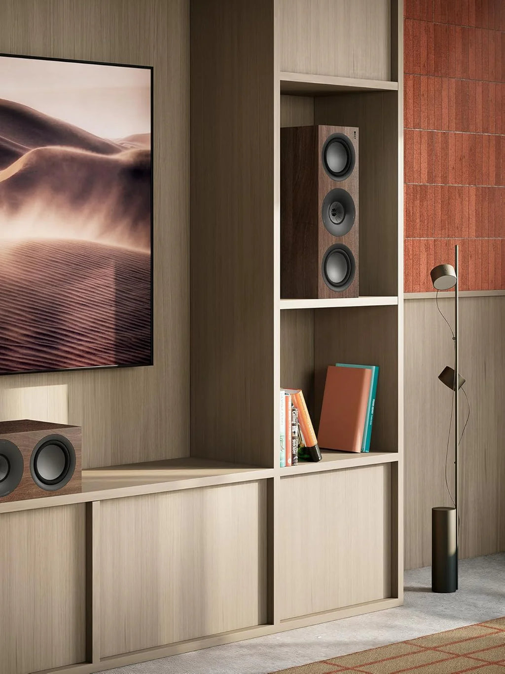 KEF Q6 Meta center speaker with sleek design and black finish, showcasing its front grille and branding for home audio setup.