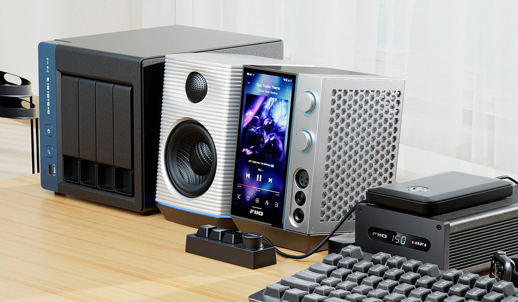 FiiO R9 music streamer device with sleek black design, multiple input ports, and control buttons for high-quality audio streaming.