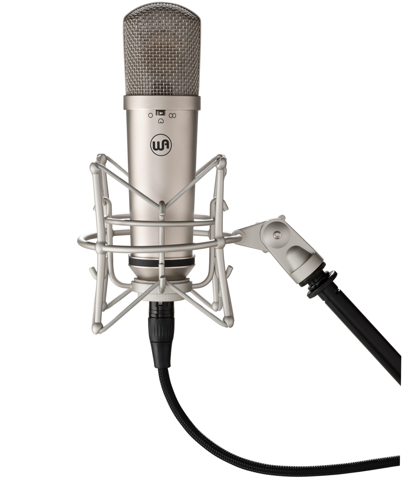 Warm Audio WA-87jr condenser microphone with nickel finish mounted on a shock mount, showing its professional studio recording setup.