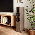 DALI Sonik 7 passive floorstanding speakers with sleek black cabinets and multiple speaker drivers for high-quality sound.