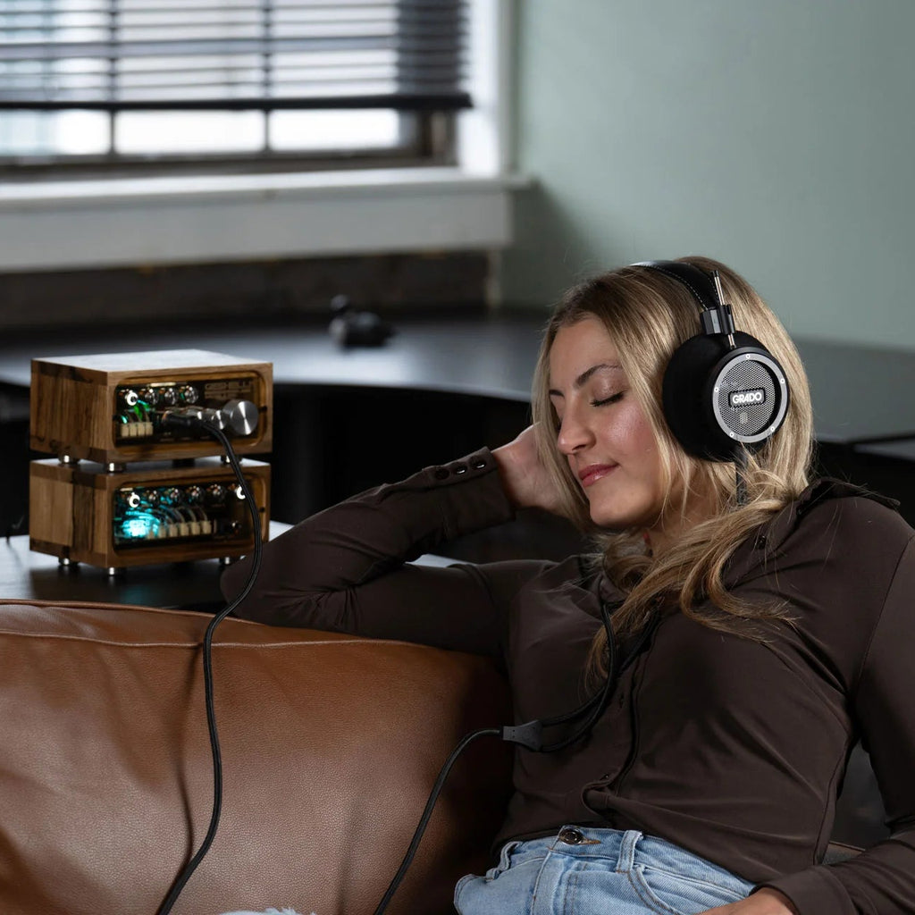 Grado Signature S750 wired headphones with over-ear design and sleek black finish, featuring premium audio quality.
