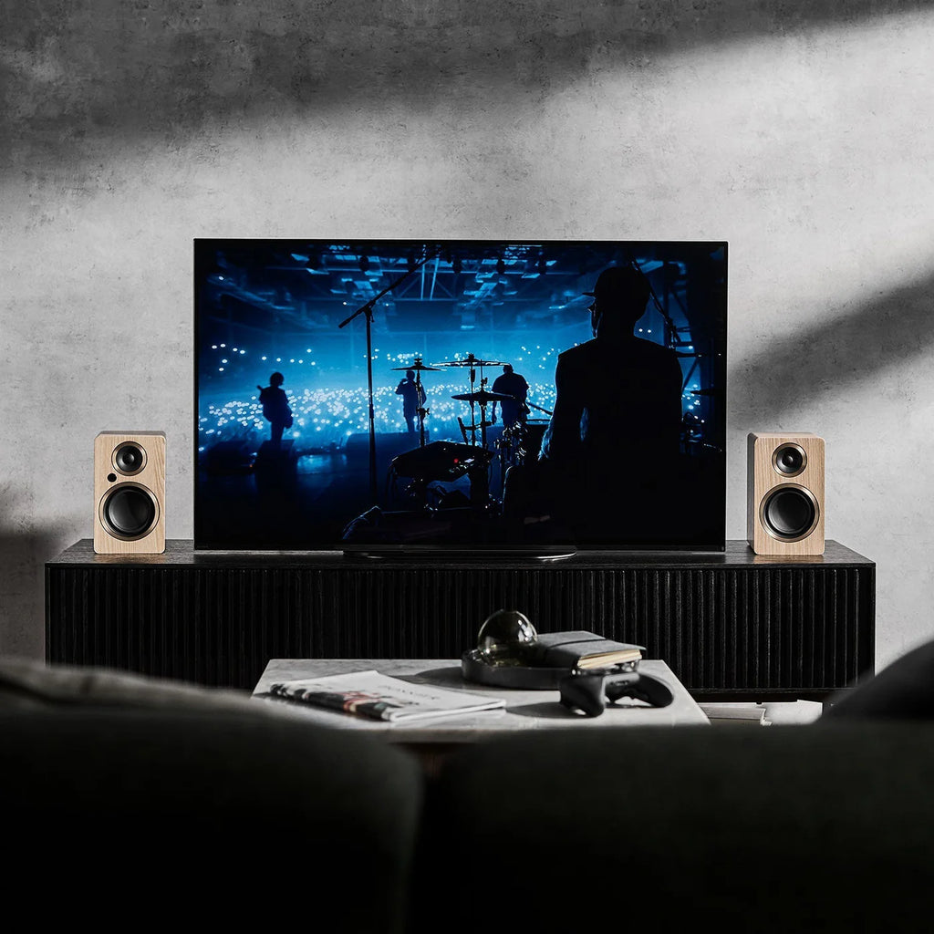 Argon Audio Fenris A4 active bookshelf speakers with black finish, featuring sleek design and front-facing drivers.