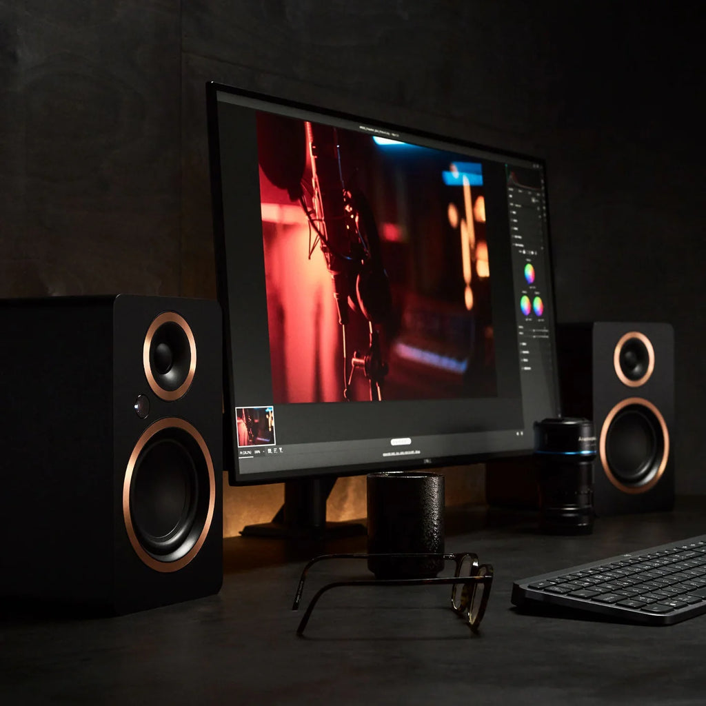 Argon Audio Fenris A4 active bookshelf speakers in black, showing the front view with drivers and sleek design.