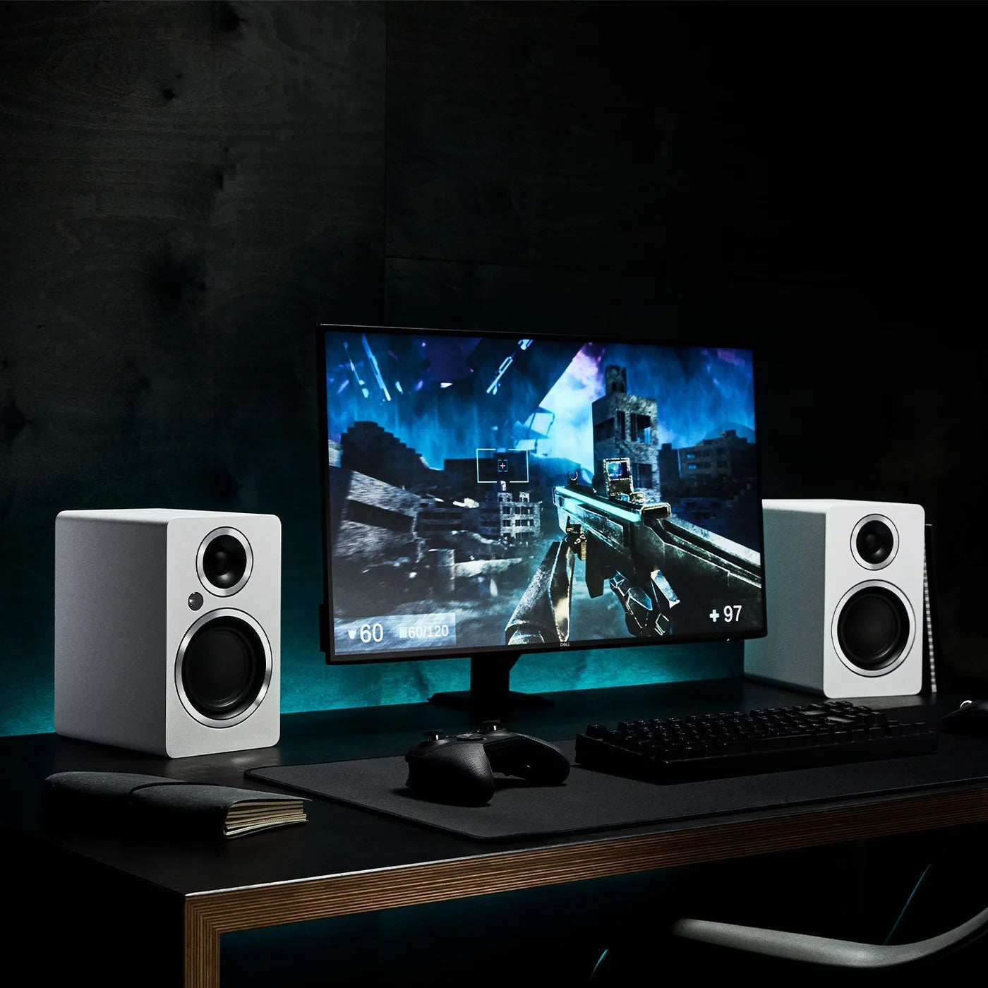 Argon Audio Fenris A4 active bookshelf speakers in white with black speaker cones and sleek modern design.