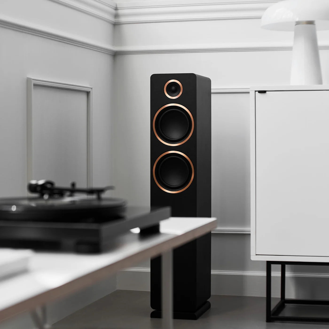 Argon Audio Fenris A55 floorstanding speakers in black with sleek wooden finish, tall design, and multiple speaker drivers.