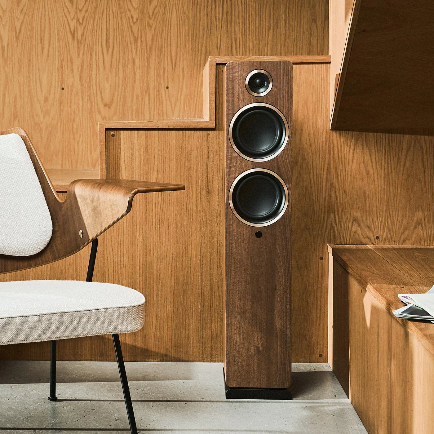 Argon Audio Fenris A55 floorstanding speakers with sleek black wood finish and modern design for high-quality sound.
