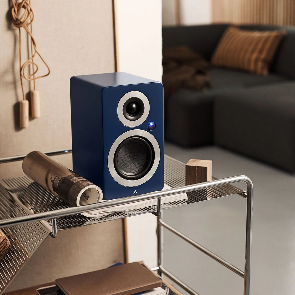 Argon Audio Forte A4 WiFi active bookshelf speakers with black wood finish, showcasing sleek design and front-facing speaker grille.