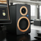 Argon Audio Forte A4 MK2 active bookshelf speakers in black with wooden finish, showing the front grille and control panel.